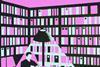 A man in a pink library