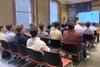 People listening to a presentation