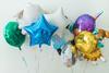 A collection of helium party balloons