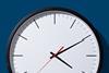A clock face showing ten past four