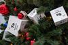 Photograph of paper cubes with elements of the periodic table of Mendeleev on the Christmas tree