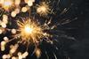 Bright close up of sparklers burning with black background