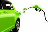 Illustration of a green car being refueled with leaves to signify a carbon-neutral fuel