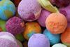 A picture of bath bombs in bright colours