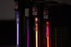 A photograph of glass emission tubes containing air, nitrogen, helium and neon, used for producing atomic emission spectra