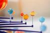 A plastic model of the solar system in a classroom
