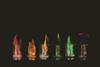 Six beakers with different coloured flames in a row