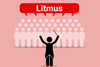 A conductor prompts a choir of people respond together with the word Litmus