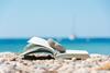 A book on a beach