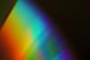 Visible light spectrum from red to blue on black background
