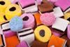 A close up photo of liquorice allsorts sweets