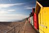 A row of beach huts in summer