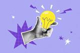 Grey hand holding a cartoon yellow light bulb on purple background