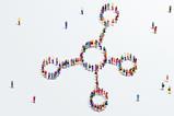 A crowd gathering in the shape of a molecule