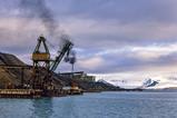 A coal mining facility next to the sea