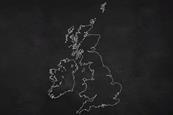 A map of the UK and Ireland in chalk on a blackboard