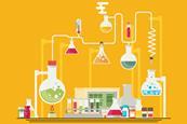 A workbench with practical chemistry equipment on it