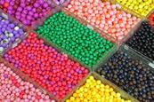 A number of different mixtures of different coloured beads