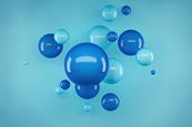 A 3D rendered illustration of dark and light blue spheres or bubbles against a turquoise background