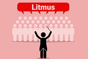 A conductor prompts a choir of people respond together with the word Litmus