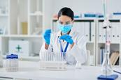 Woman in a lab conducting a research experiment