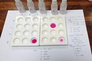 A photo of small bottles and spot plates