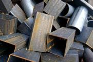 A pile of scrap iron with brown rust visible