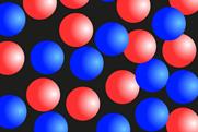 An illustration with red and blue circles representing particles of two gases mixing