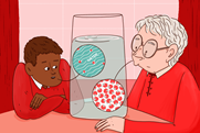 An image showing a male student and a teacher discussing different ways of representing water in solution, to challenge misconceptions about the particle model