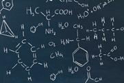 A picture showing a blackboard with chemical formulas written in white chalk