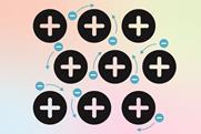 A 2d diagram showing a lattice of positively charged particles in a sea of free electrons