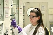 Erin Maciejewski working in a lab.