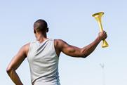 Athlete holding a fire torch