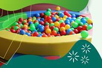 A children's ball pool filled with coloured balls