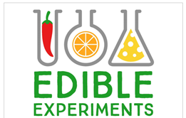 logo for edible experiments showing cartoon foods in flasks and test tubes