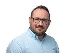 A headshot of John O'Donoghue against a plain white background