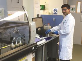 Photo of Harsh Shar, analytical chemist, working in a lab at Thames Water