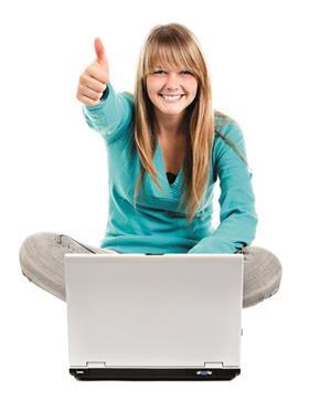 A student on her laptop giving a thumbs up