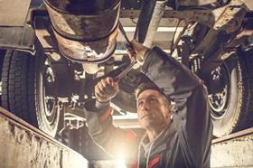 Mechanic working on a car