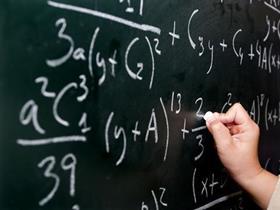 Writing equations on a blackboard