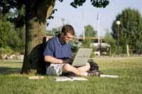 An independent learner working on a laptop