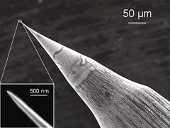 Figure 2 - Image of an STM tip under both 1000x and 100,000x magnification