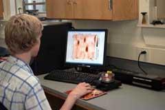 Undergraduate using bench-top STM