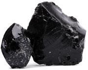 Obsidian, a glass formed in volcanoes, looks quite a bit like the nuclear