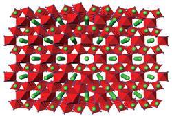 Crystal structure of Gd2Zr2O7 pyrochlore, one of the mineral ceramics that Hyatt bases his designs upon. Showing ZrO6 octahedra in red, gadolinium (Gd) atoms in green, and oxygen (O) atoms as small blue spheres