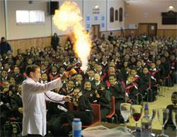 Stephen Ashworth demonstrating an experiment involving fire