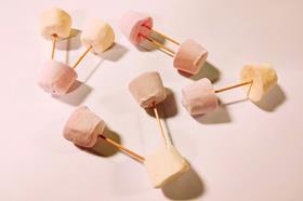 Models of elements and compounds using pink and white marshmallows and cocktail sticks
