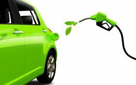 Illustration of a green car being refueled with leaves to signify a carbon-neutral fuel