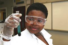 A student holding a test tube