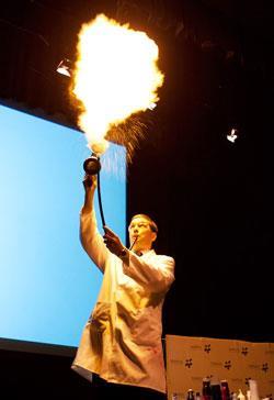 Blowing flames in a Kitchen chemistry demonstration